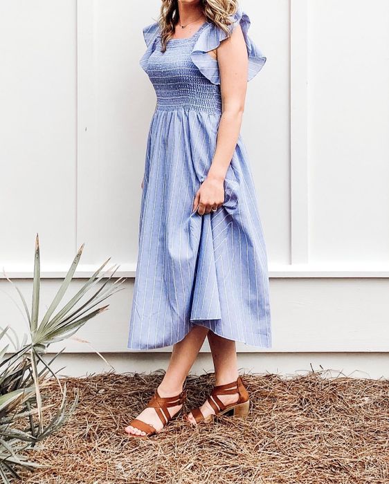 A reviewer styling the dress with tan sandals for a casual, chic look.