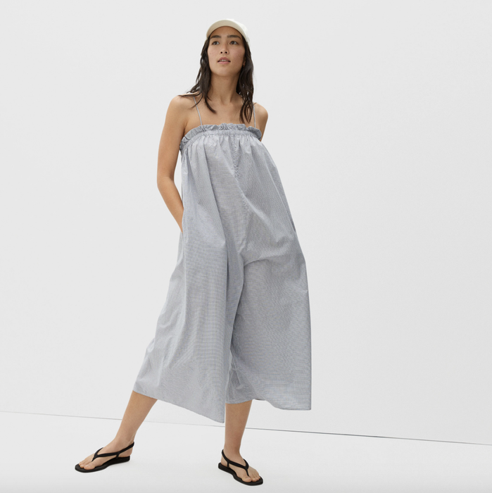 The jumpsuit in a stylish gray color.