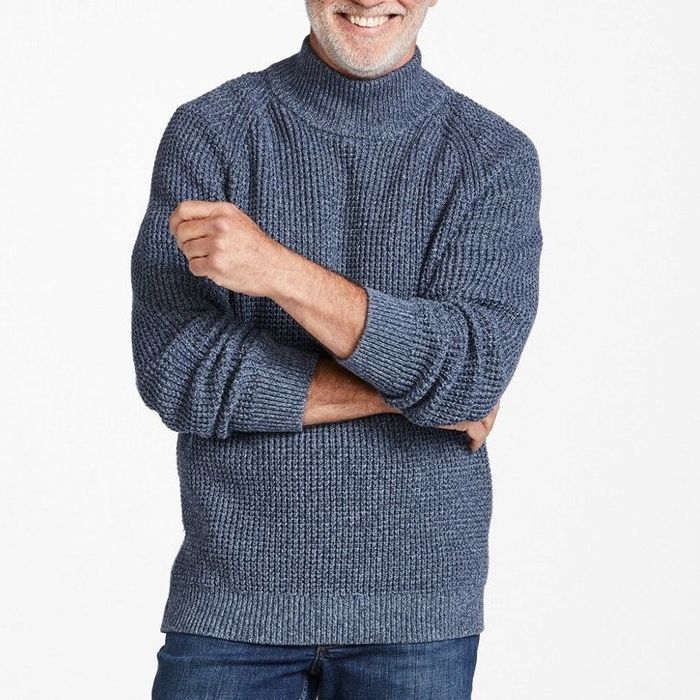 Model showing off the indigo sweater, front view