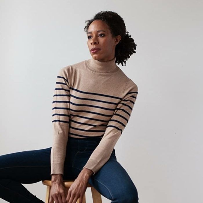 Reviewer wearing a striped sweater