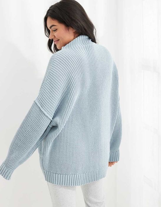 Model in a light blue sweater
