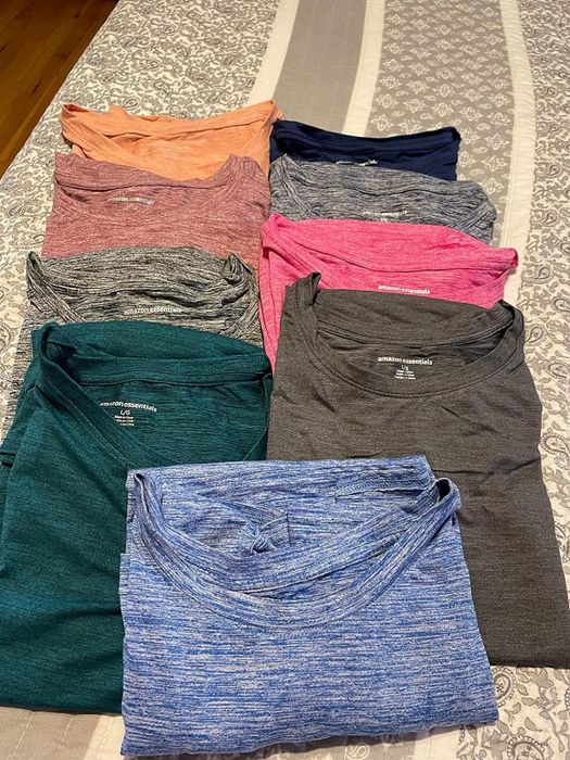 A photo of the reviewer wearing the shirts.