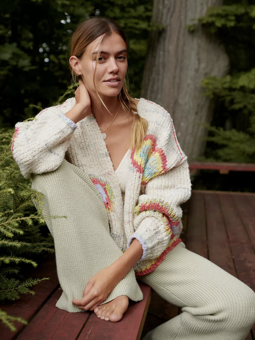 Model styled in the cardigan paired with lounge pants