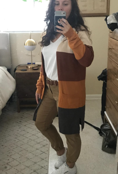 Reviewer wearing the cardigan in a mirror selfie