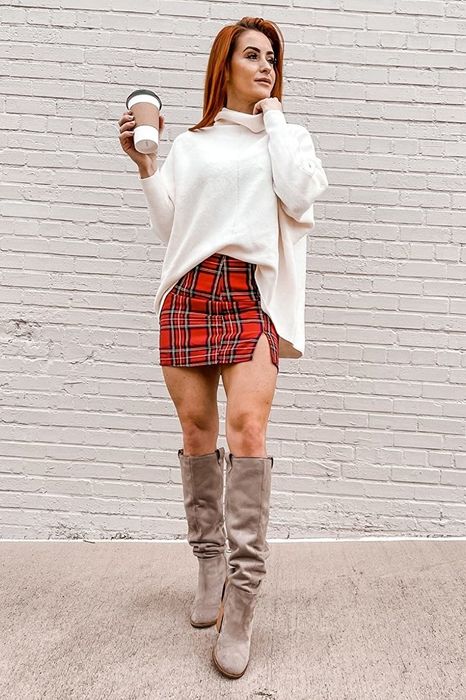 Model styling a white sweater