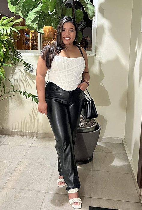 Reviewer wearing the top in white