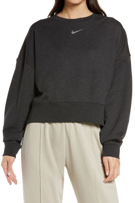 Model wearing a black sweater