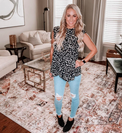 A customer review photo featuring them in the blouse in Black.