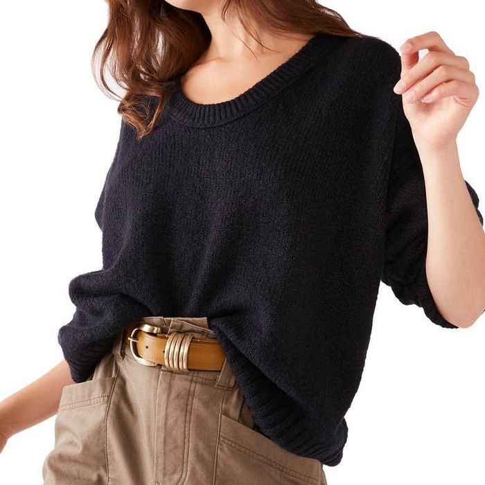 Model in a black sweater