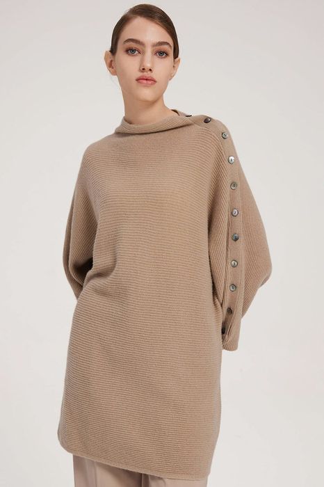 Model rocking a brown sweater