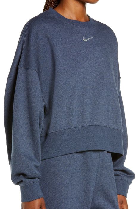 Model sporting a blue sweater