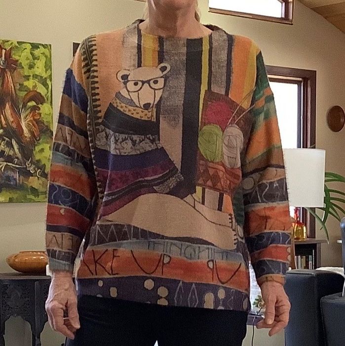 Reviewer rocking a polar bear-themed sweater