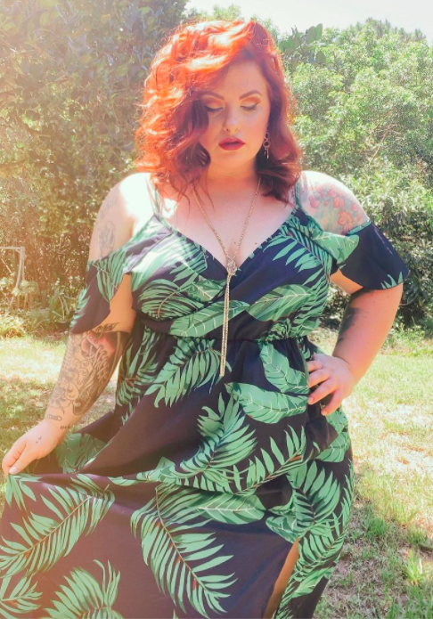 A customer review photo of the dress in action, highlighting the elegant and flattering fit.