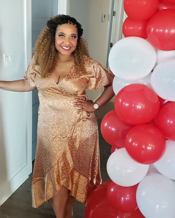 A reviewer wearing a champagne-colored dress describes their thoughts.