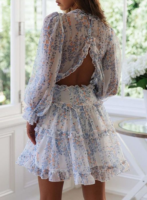 A detailed view of the back of the dress, highlighting its open-back design