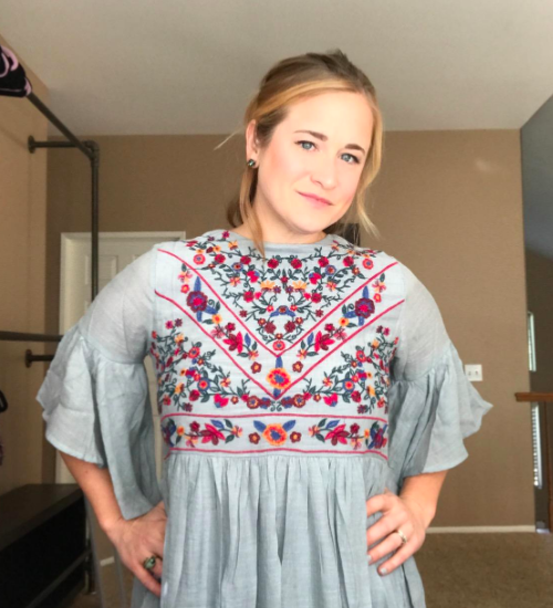 A customer review photo featuring the blue babydoll dress, demonstrating its charming and breezy look.