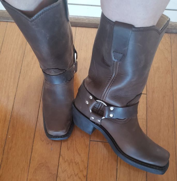 A reviewer seen in a pair of harness boots