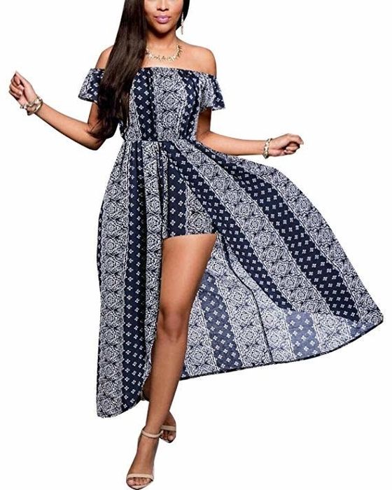 A model showcasing the dress in a navy and white print