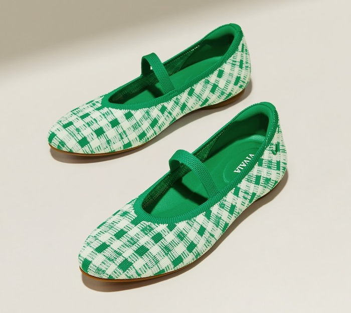 The shoes featuring a green and white checkered pattern.
