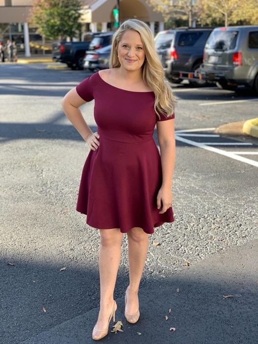 The dress in rich maroon color