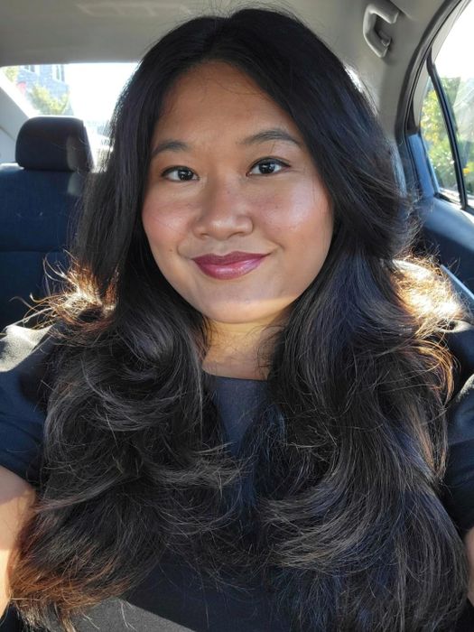 A reviewer’s loose, bouncy curls.
