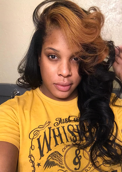 A reviewer’s hair, perfectly curled after using hot rollers.