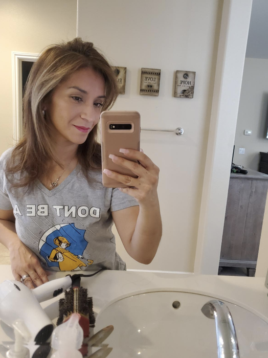 The reviewer's after shot with dry, sleek, styled hair