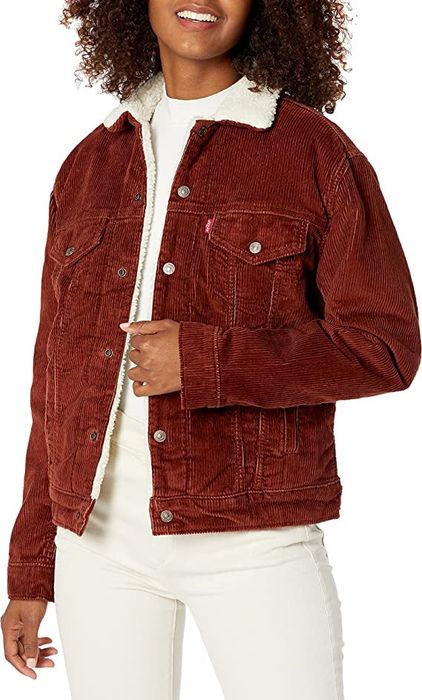 A model showcasing the jacket in a rich cherry mahogany color.