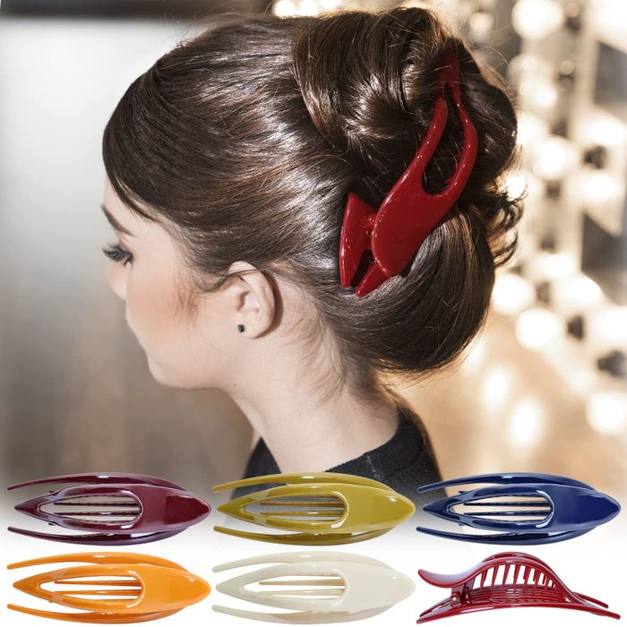 A model with their hair styled using one of the French concord curved clips.