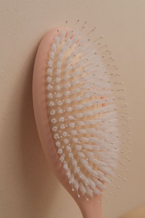 A close-up of the hair brush