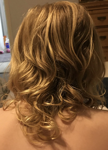 The same child with curls brushed out