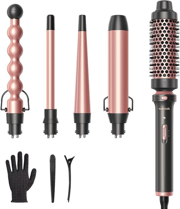 The set includes two curling barrels, one curling brush, and one tapered curling wand.