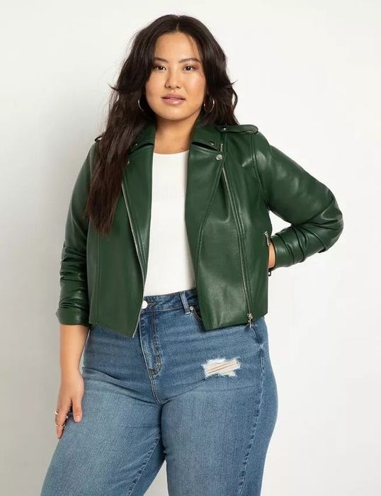 A model showcasing the jacket in a deep green hue.