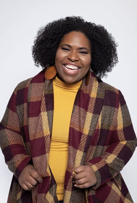 Another reviewer showing off the plum plaid coat.