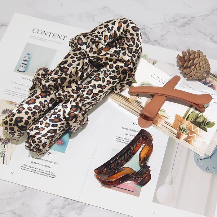 Contents of the set, neatly laid out in a cheetah print pattern