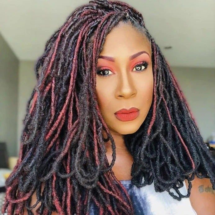 A model rocking red locs.