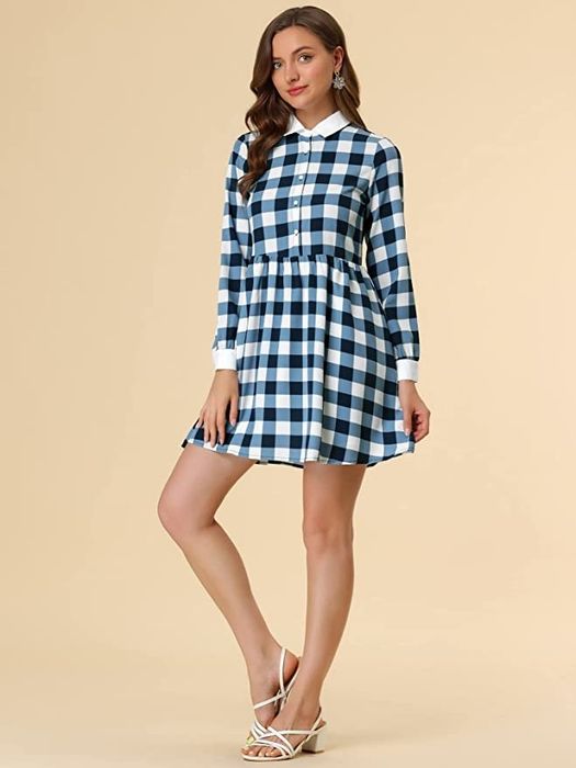 A model in a blue checkered dress