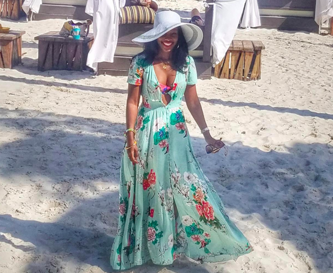 A customer review photo of the maxi dress in a soft light green.