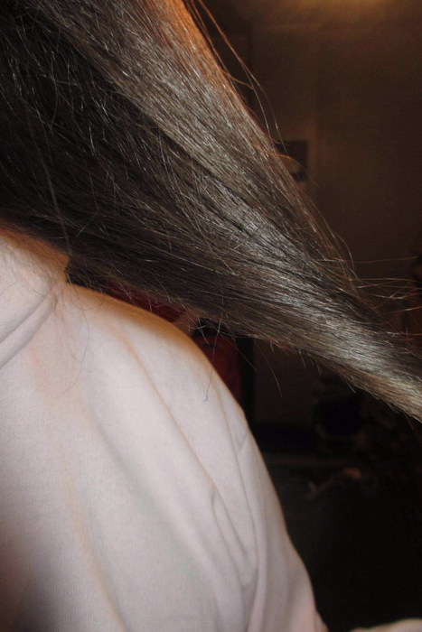 Smooth, sleek hair after applying the product