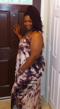 Another reviewer photo of the dress, showing the side slit up to the knee and how the tie-dye pattern meets at the side.