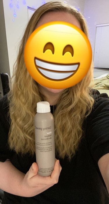 The same reviewer reveals much smoother curls after using the product.
