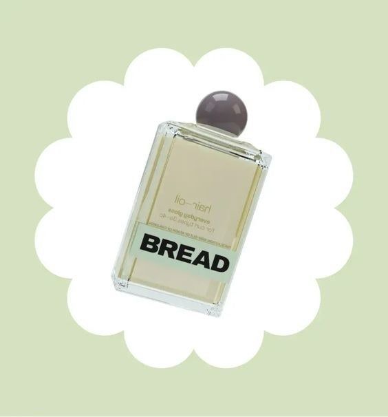 The sleek, perfume-inspired bottle of the hair oil.