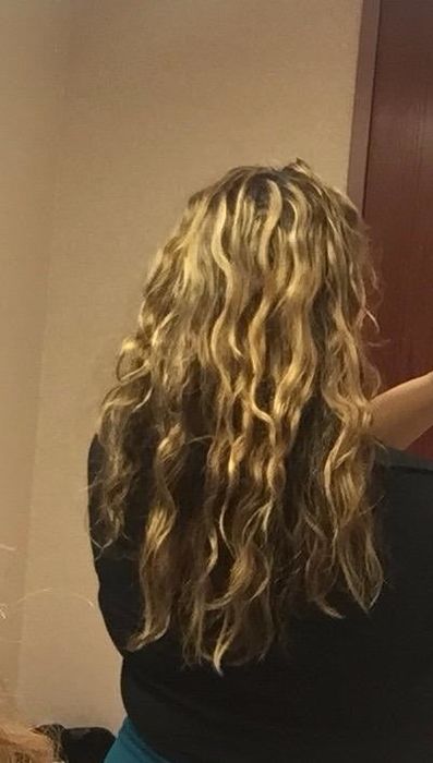 Reviewer's hair after applying the styling cream