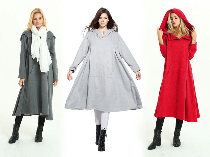 Three models showcasing the hooded dresses in dark gray, light gray, and red.