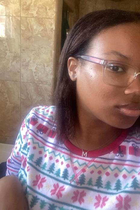 The same reviewer now sporting sleek, straight hair