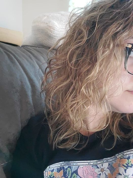 The reviewer's hair after using the spray