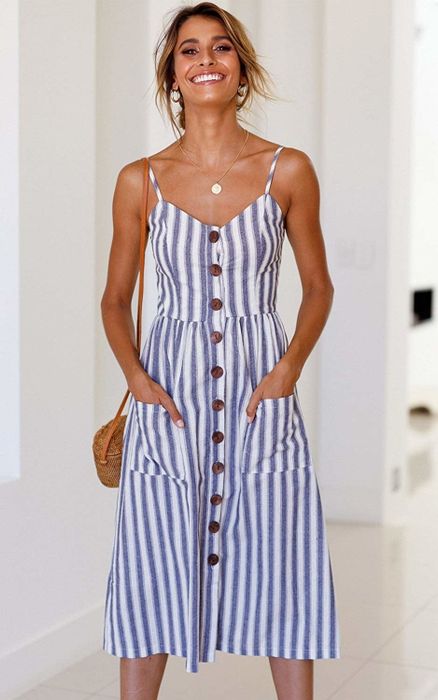 A model wearing a blue and white striped spaghetti-strap dress