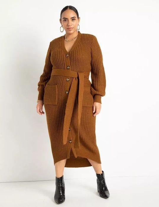 model styling the brown dress with black boots