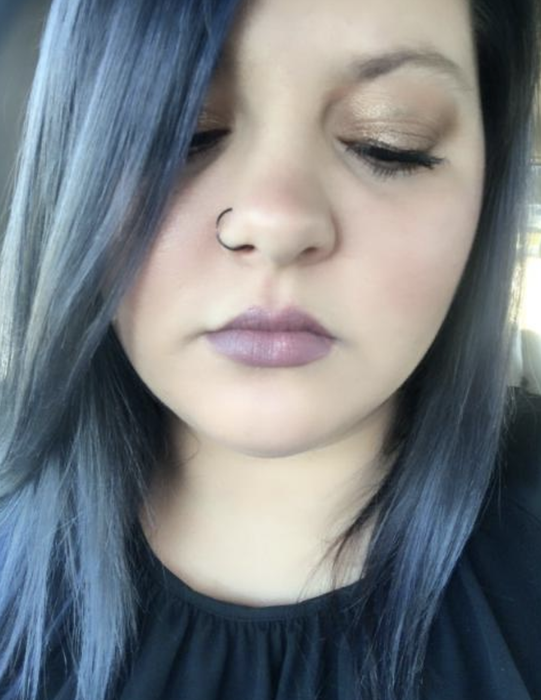 Reviewer's hair looking shiny and healthy after using the treatment
