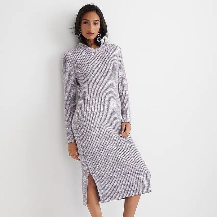 The model is wearing a gray dress.